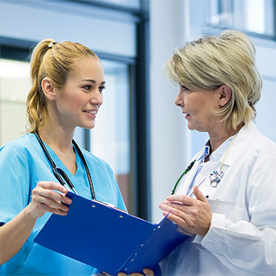 Doctors Looking at Notes