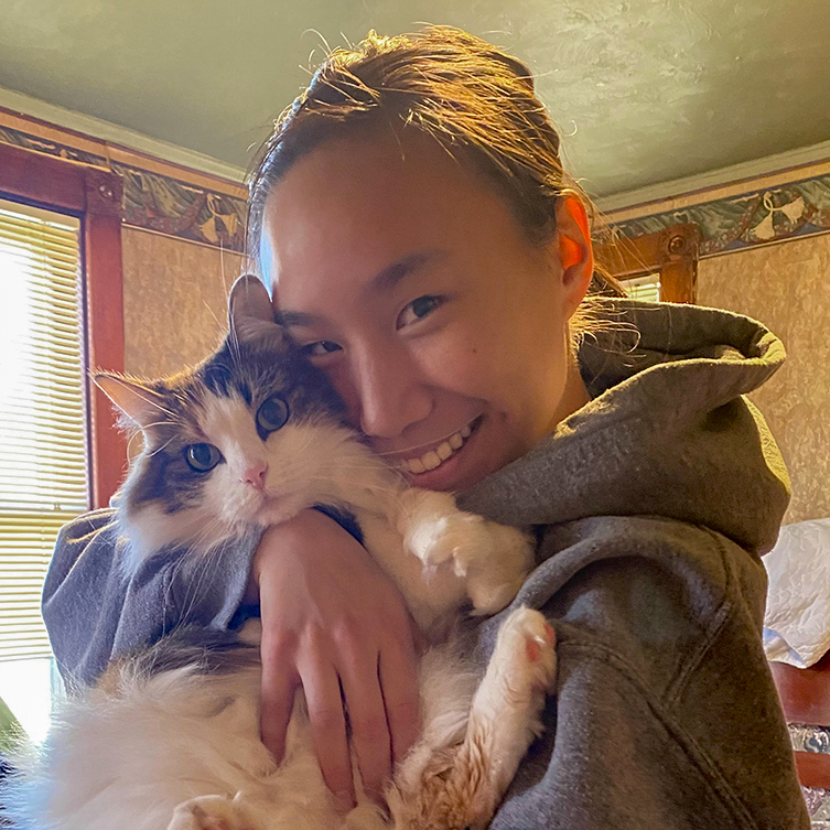 ATSU-ASHS Master of Science in Occupational Therapy student Shaunna Erickson poses with her cat, Oscar